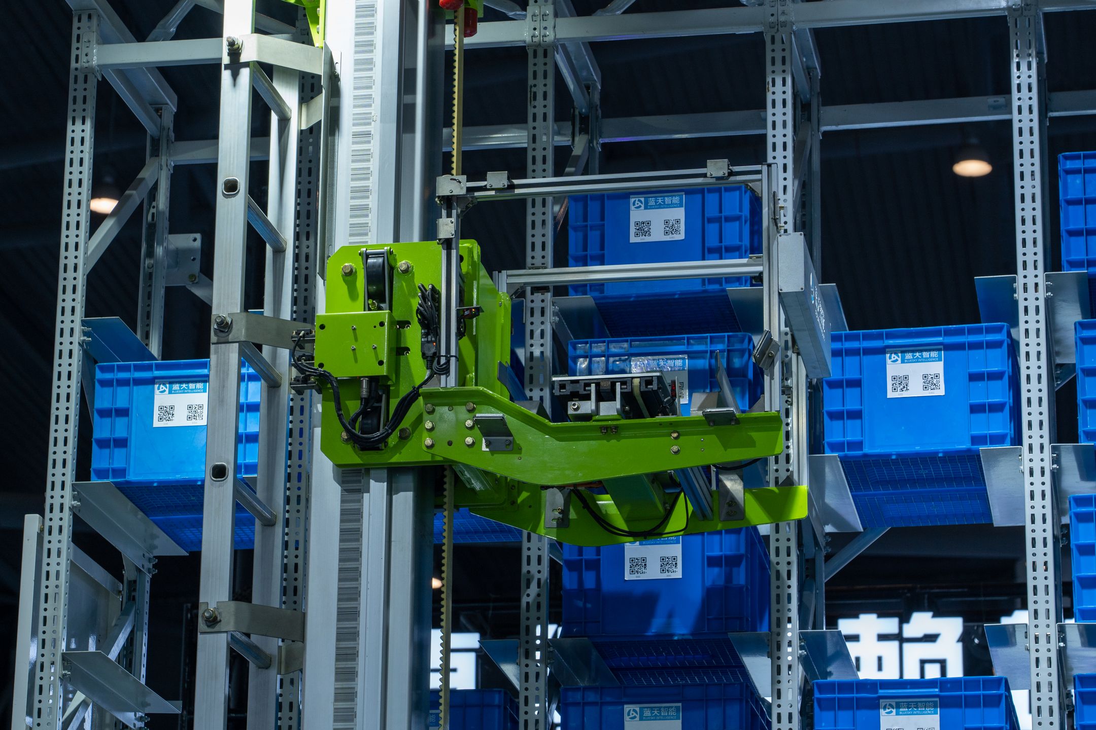 Autonomous mobile robot navigating a warehouse aisle