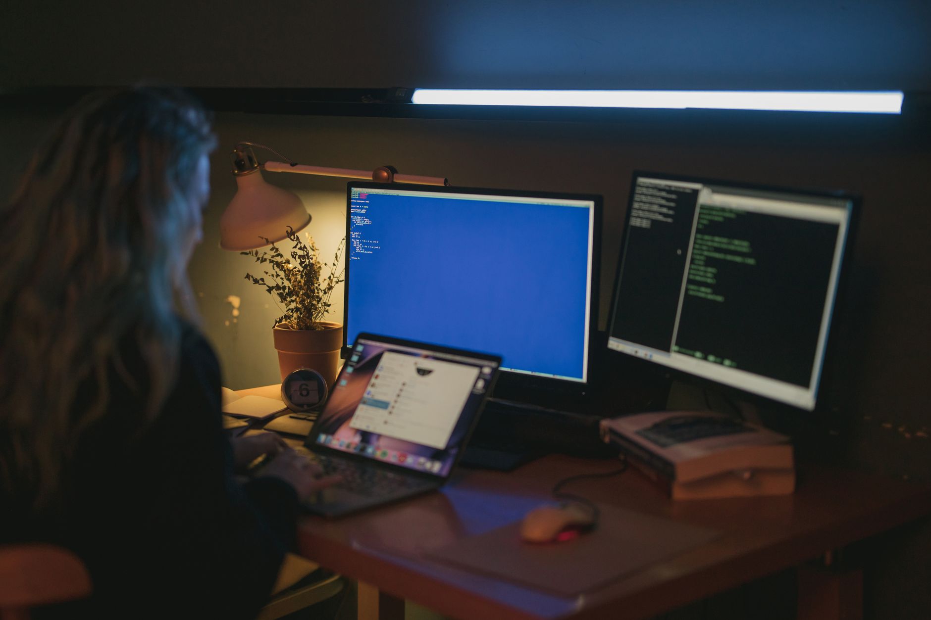 Cybersecurity analyst reviewing a CMMC compliance checklist