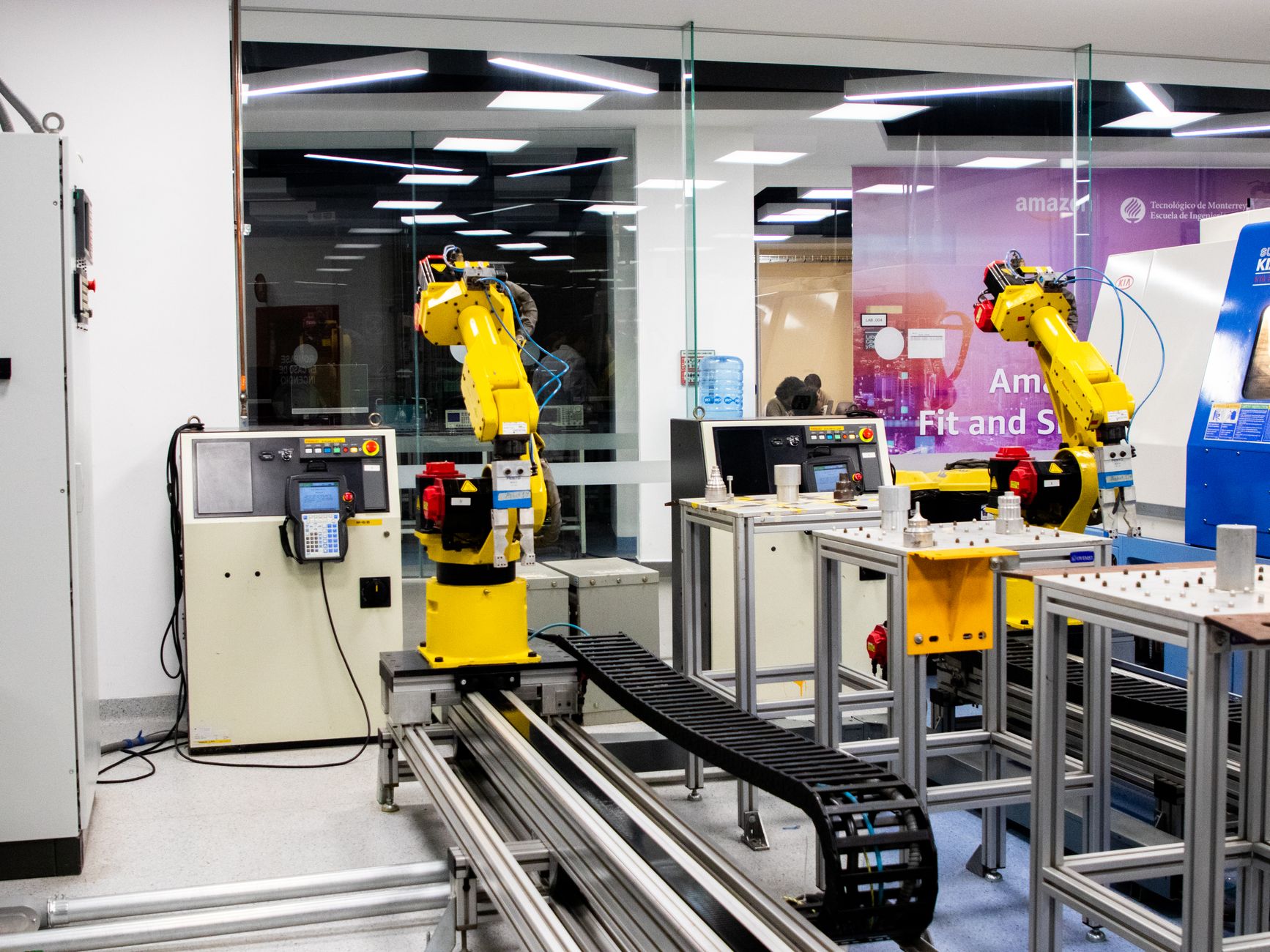Engineer programming a collaborative robot arm