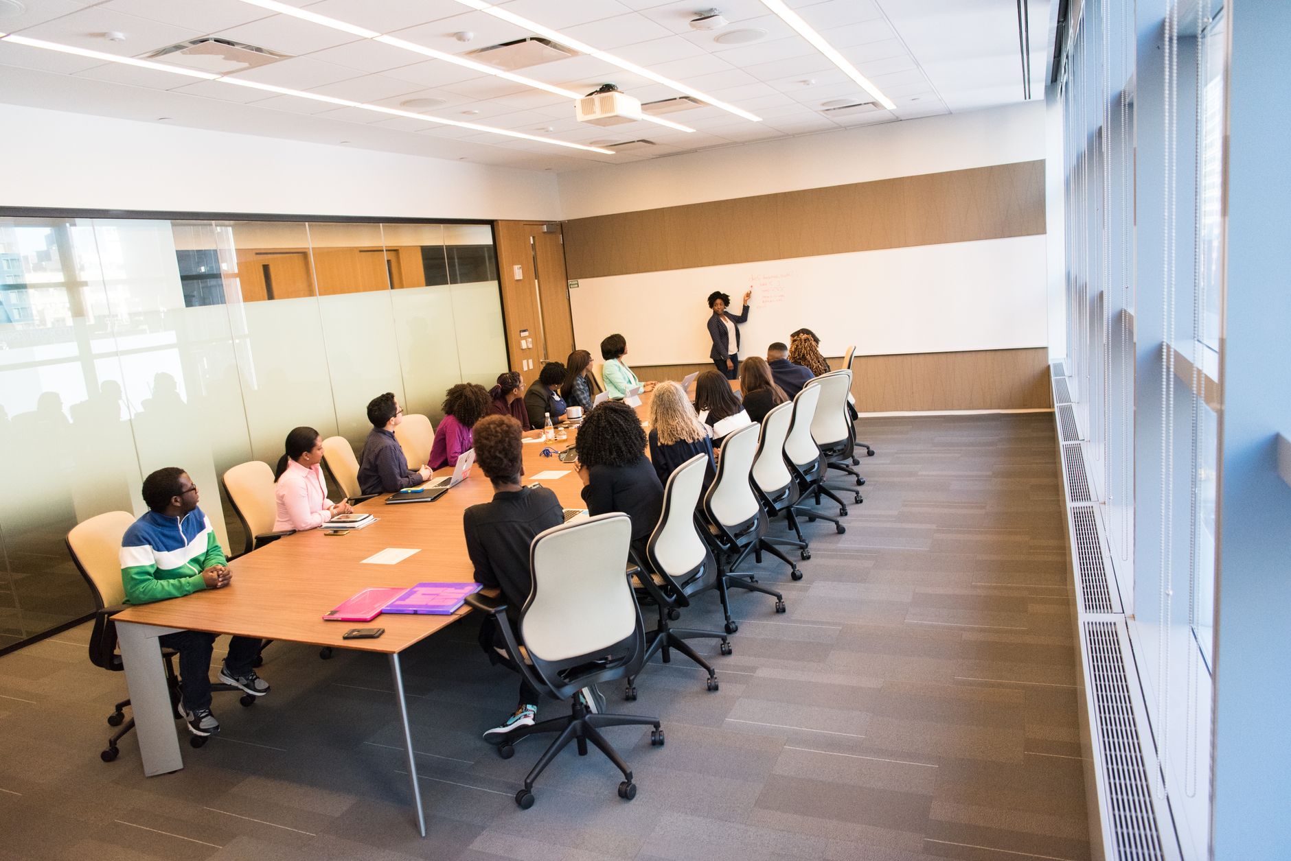 Instructor teaching skills matrix development to a group