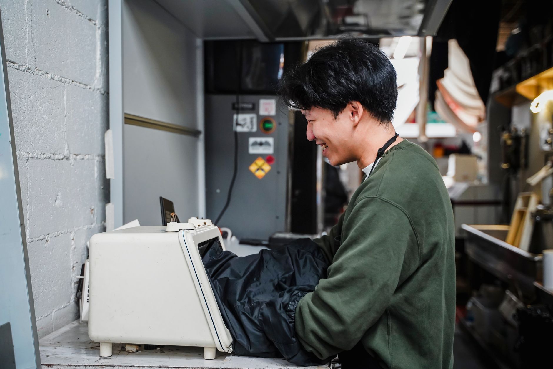 Worker demonstrating a learned skill for verification