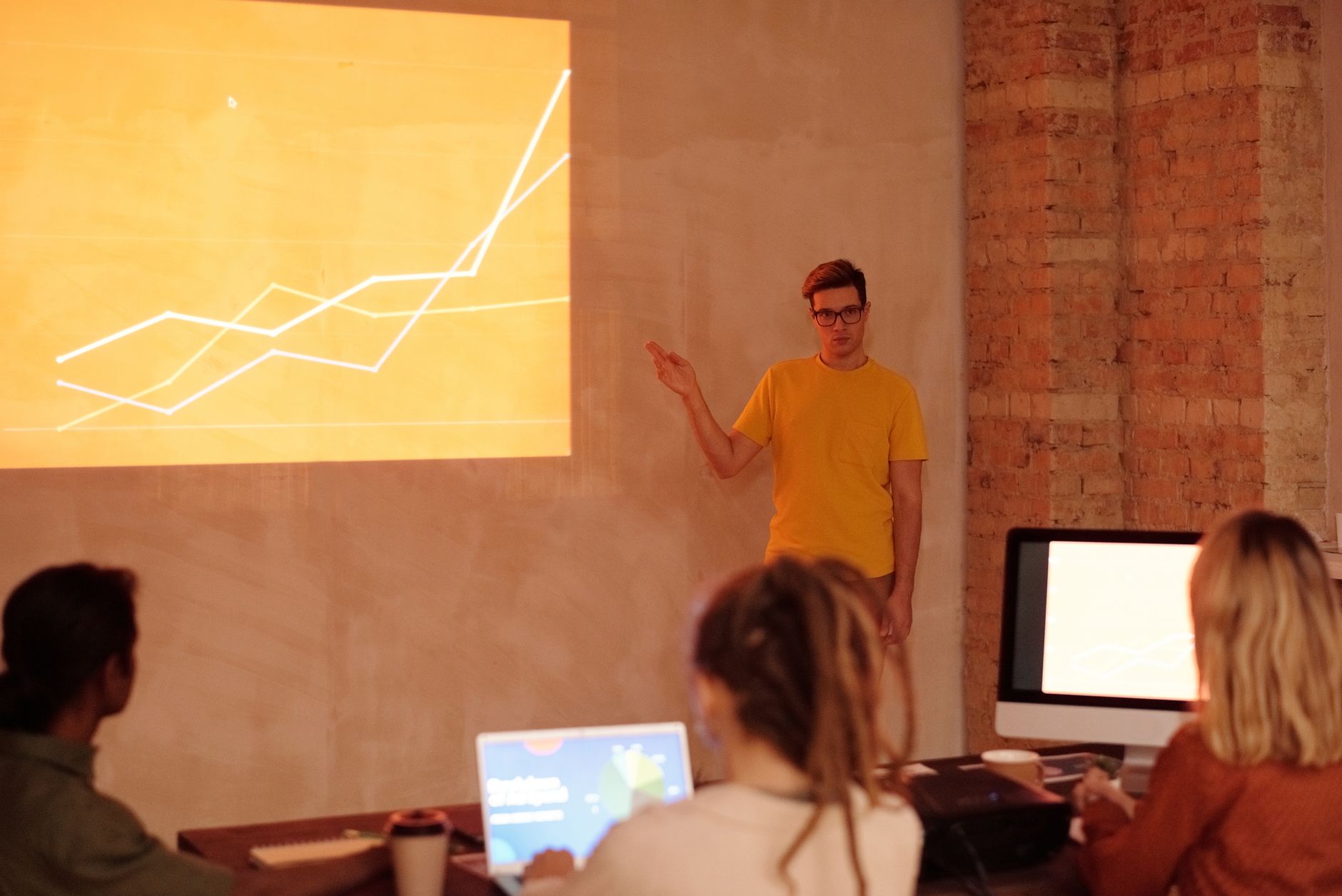 Instructor explaining digital transformation concepts to a group