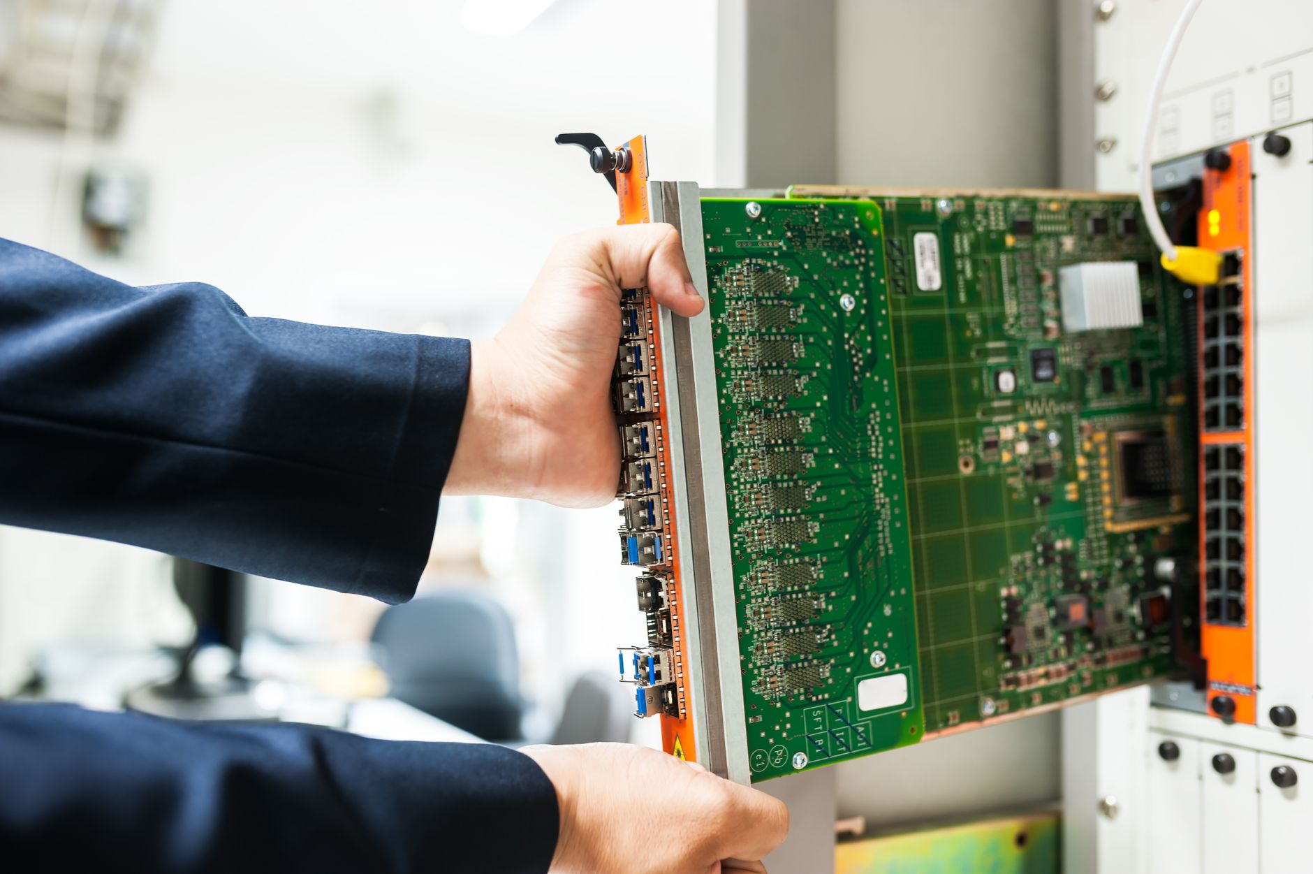Technician configuring an industrial network router