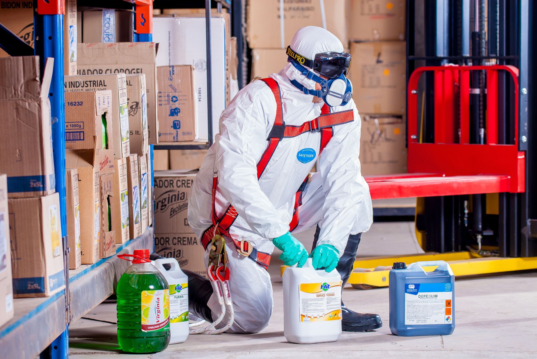 Supervisor inspecting a chemical storage area for proper labeling