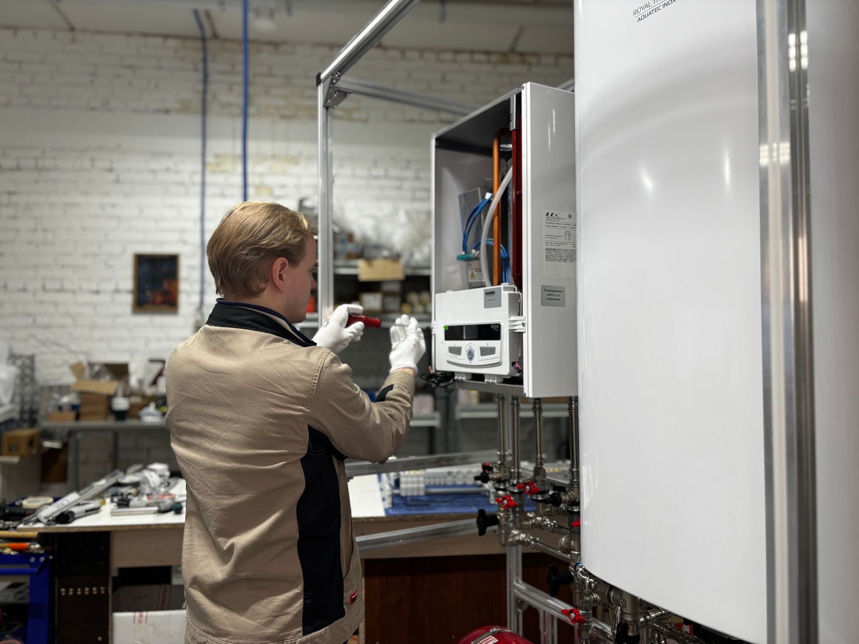 Technician installing a wireless sensor for condition monitoring