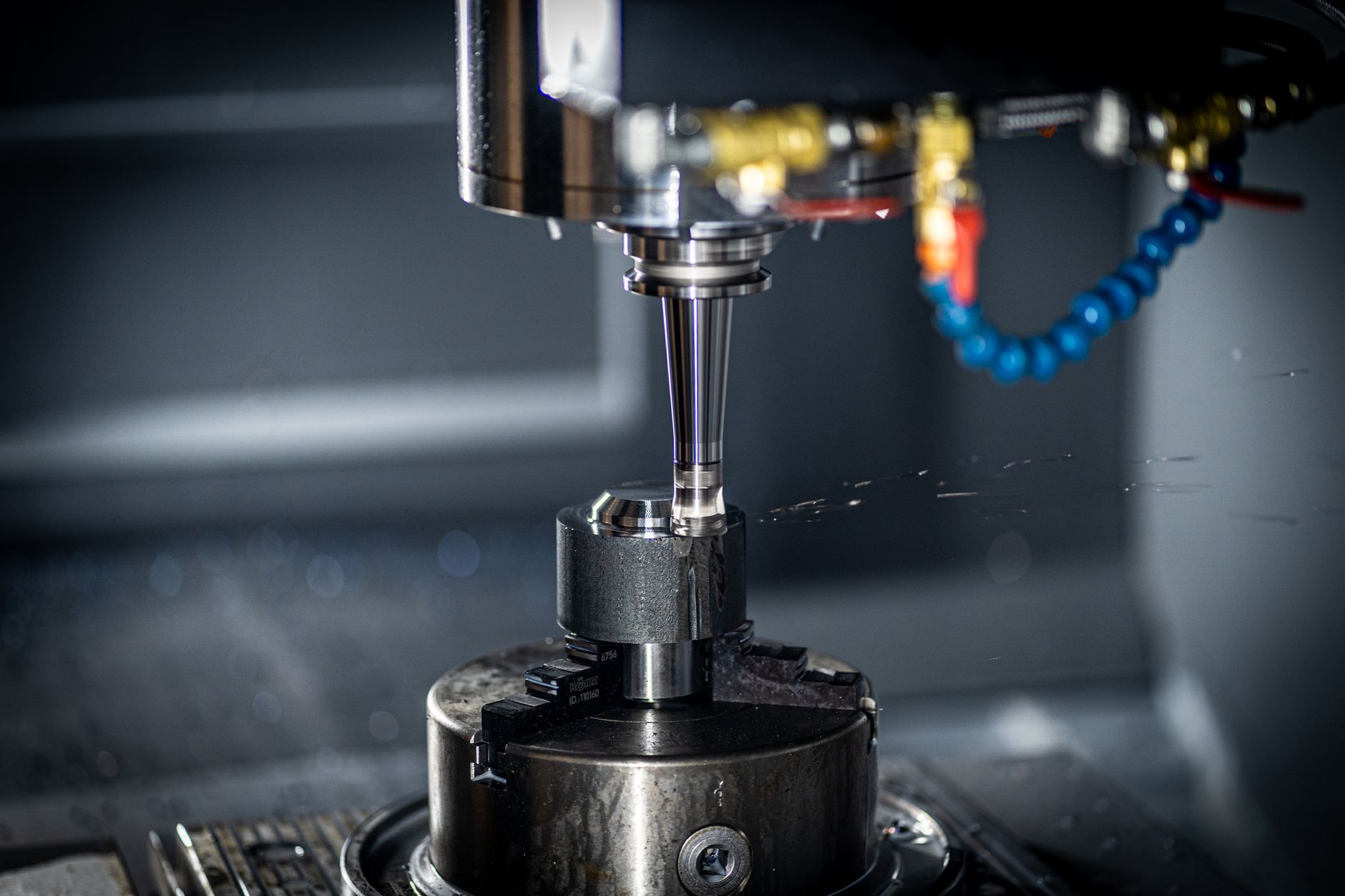 CNC machine spindle and tool holder in a modern machine shop