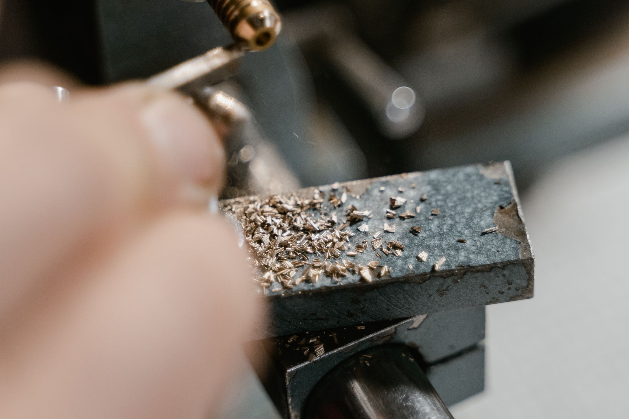 Machinist selecting a cutting tool for a lathe operation
