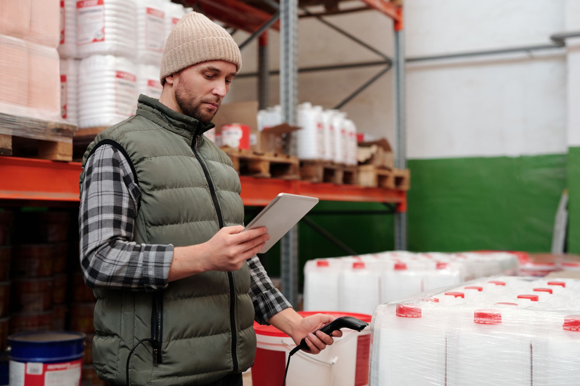 Supervisor scanning a barcode to update a work order