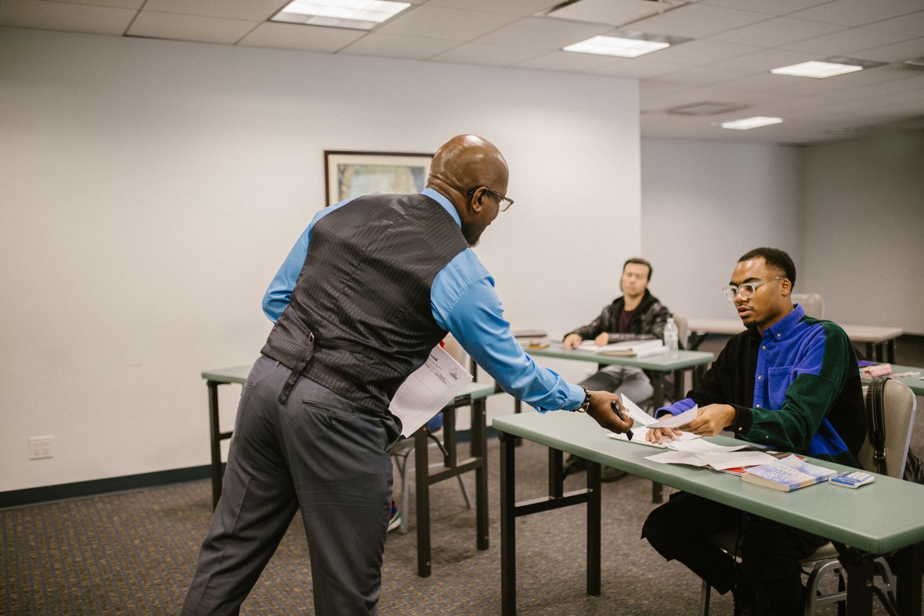 Instructor teaching safety fundamentals to new manufacturing employees