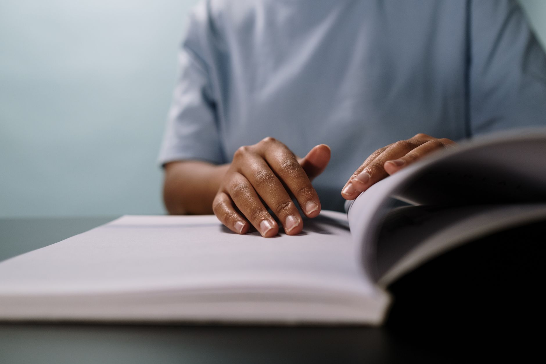 Manufacturing trainee reading a safety training manual