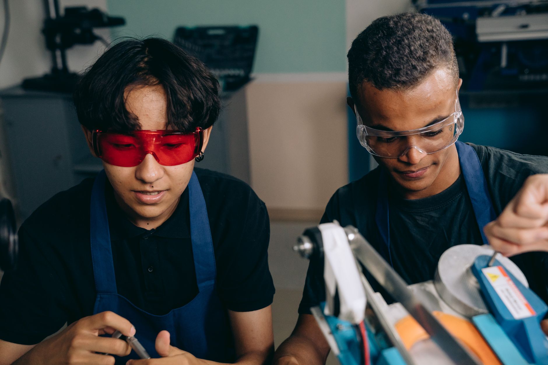 Instructor evaluating a hands-on skill demonstration