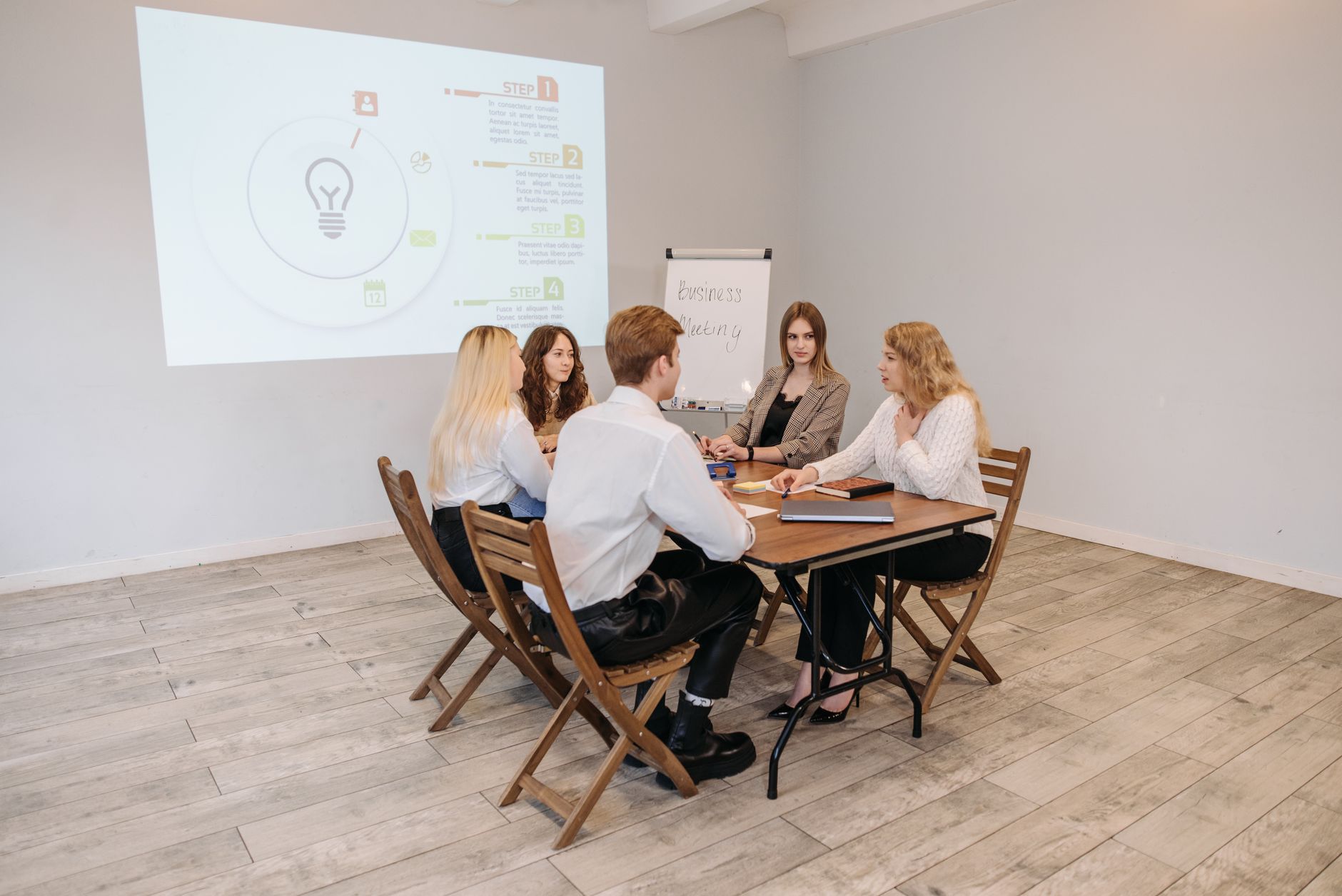 Instructor teaching OT cybersecurity fundamentals to a class