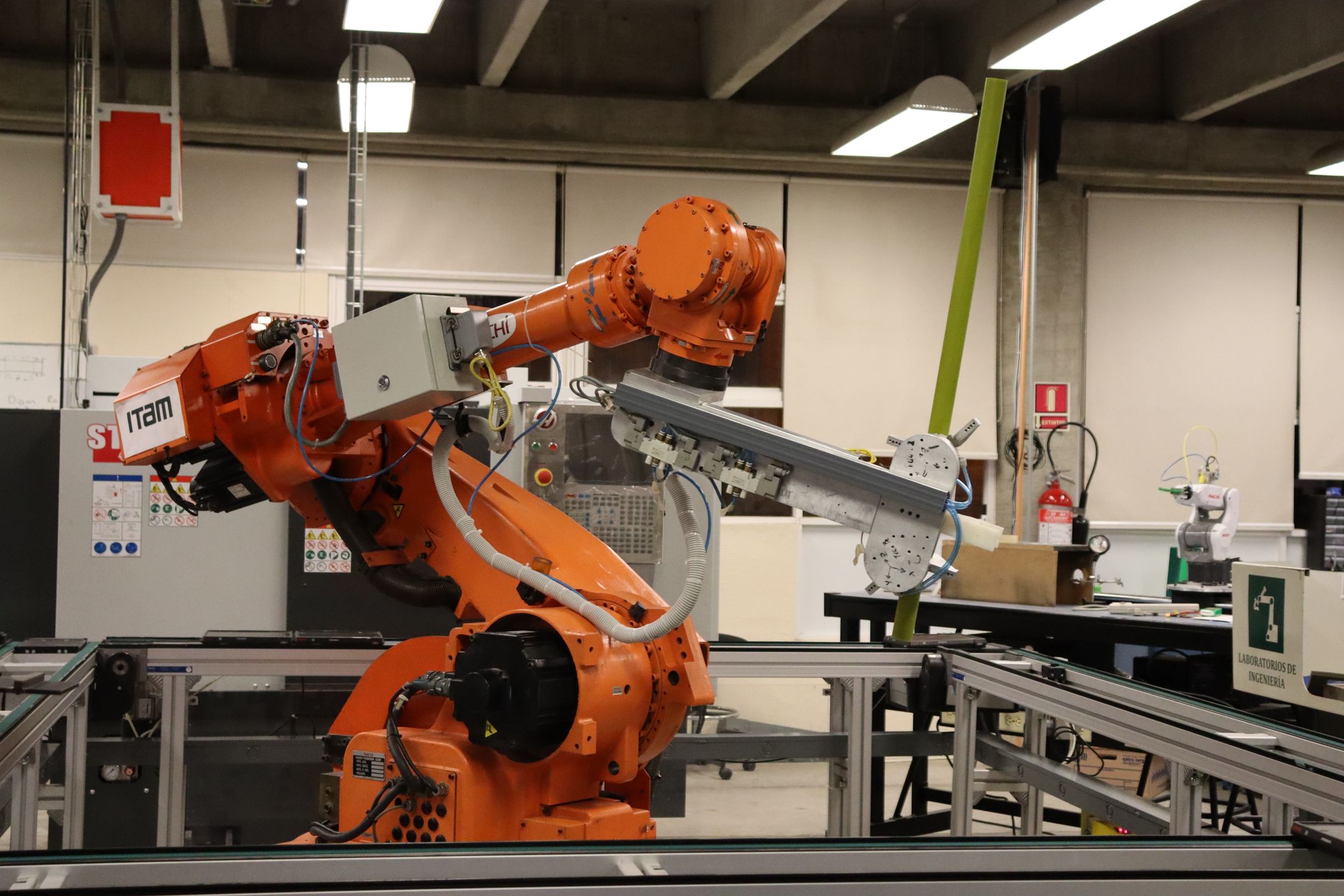 Industrial robotic arm in an automated facility