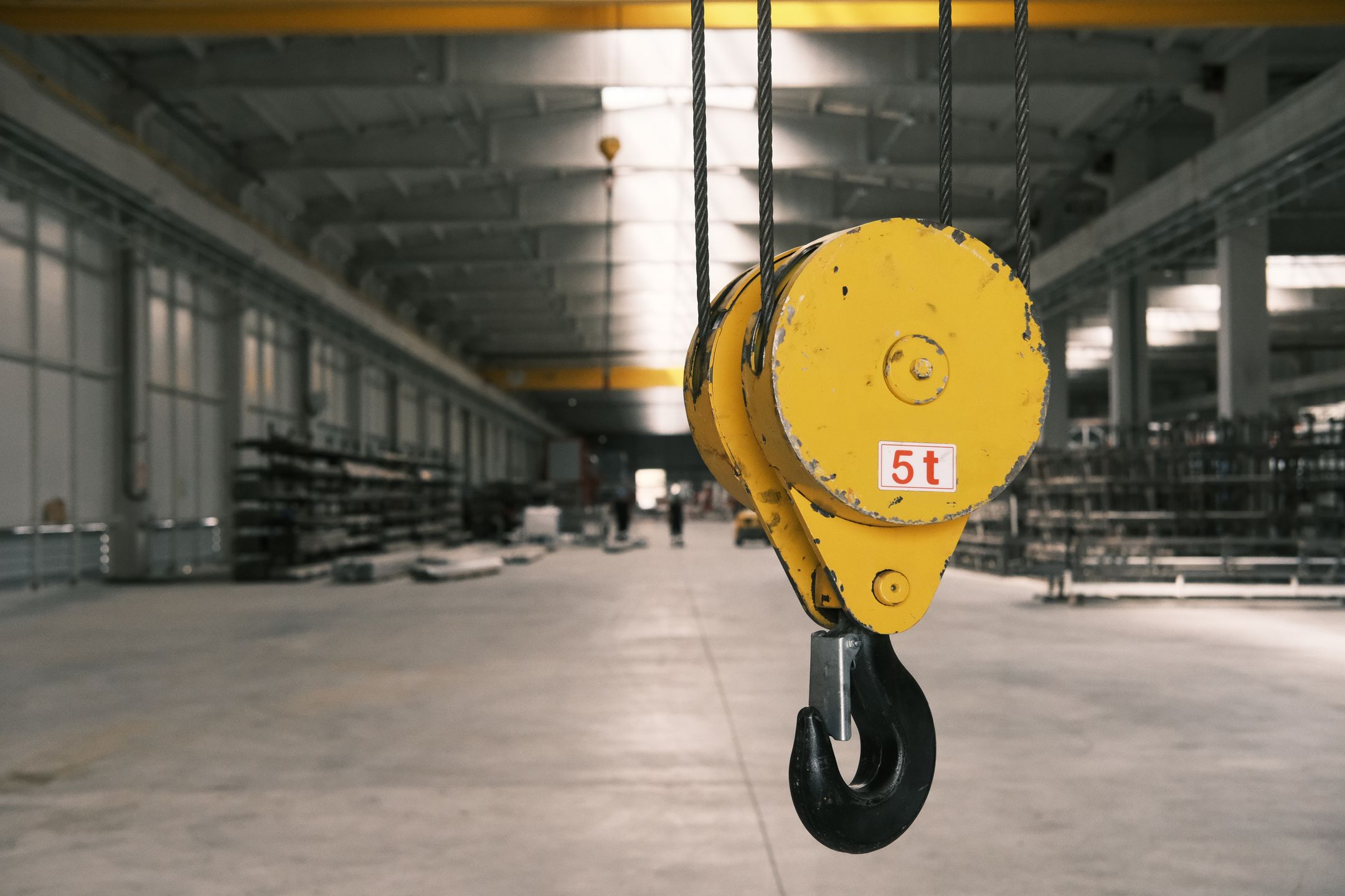 Crane operator lifting a rigged load