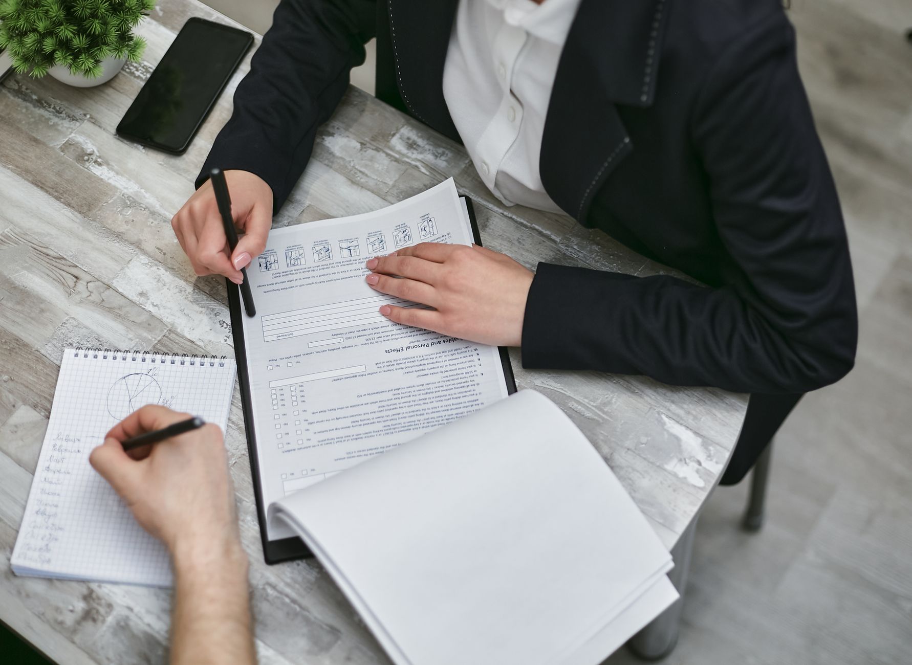 Quality manager reviewing a substance compliance checklist