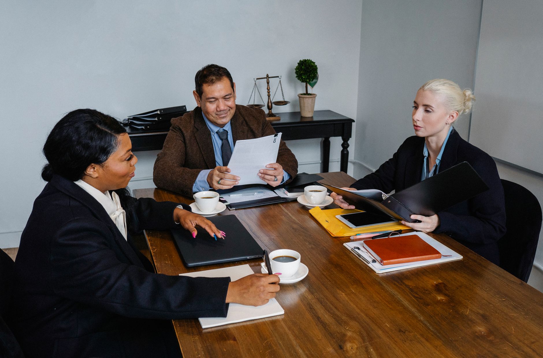 Team reviewing social compliance audit findings