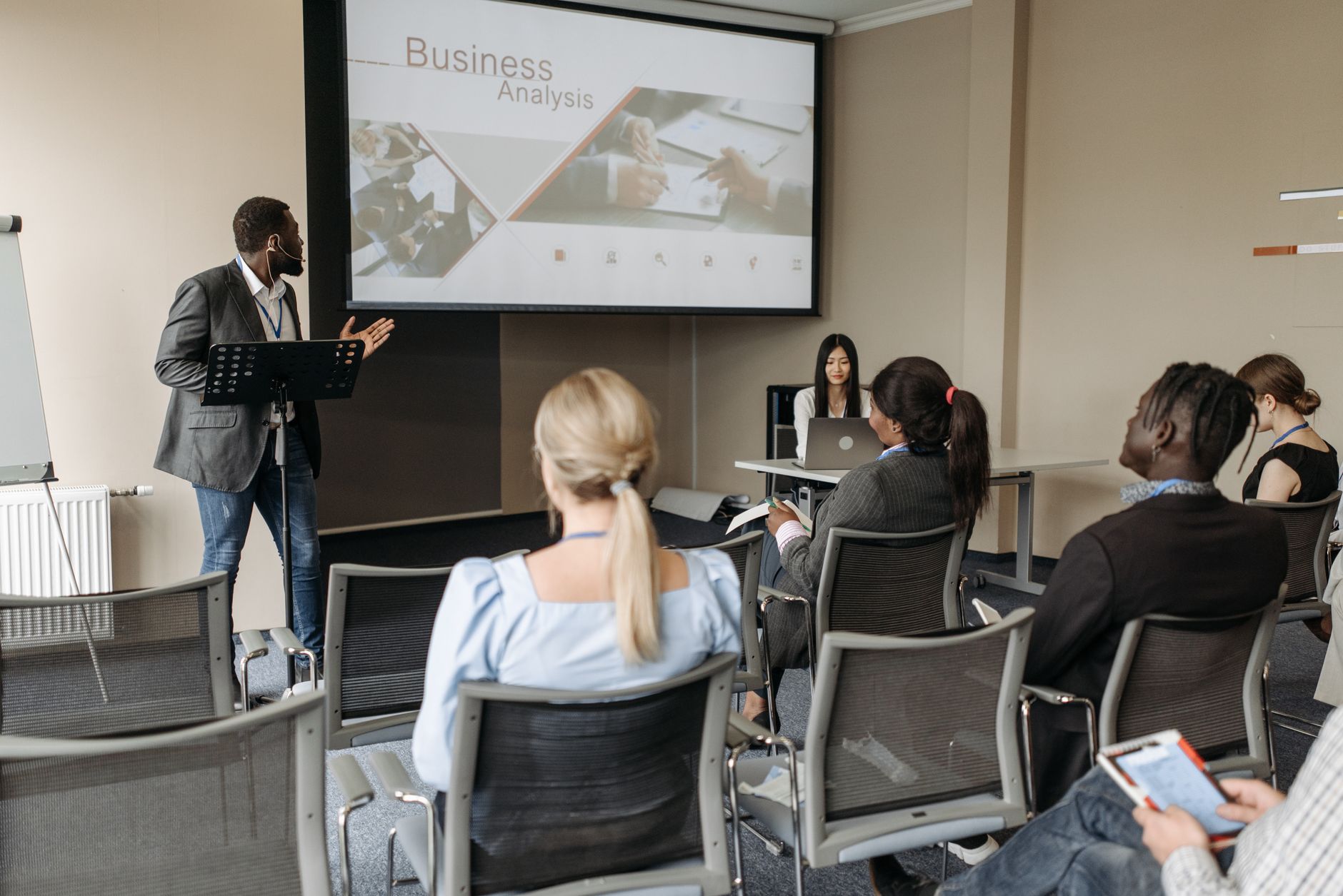 Instructor teaching a supply chain risk management workshop