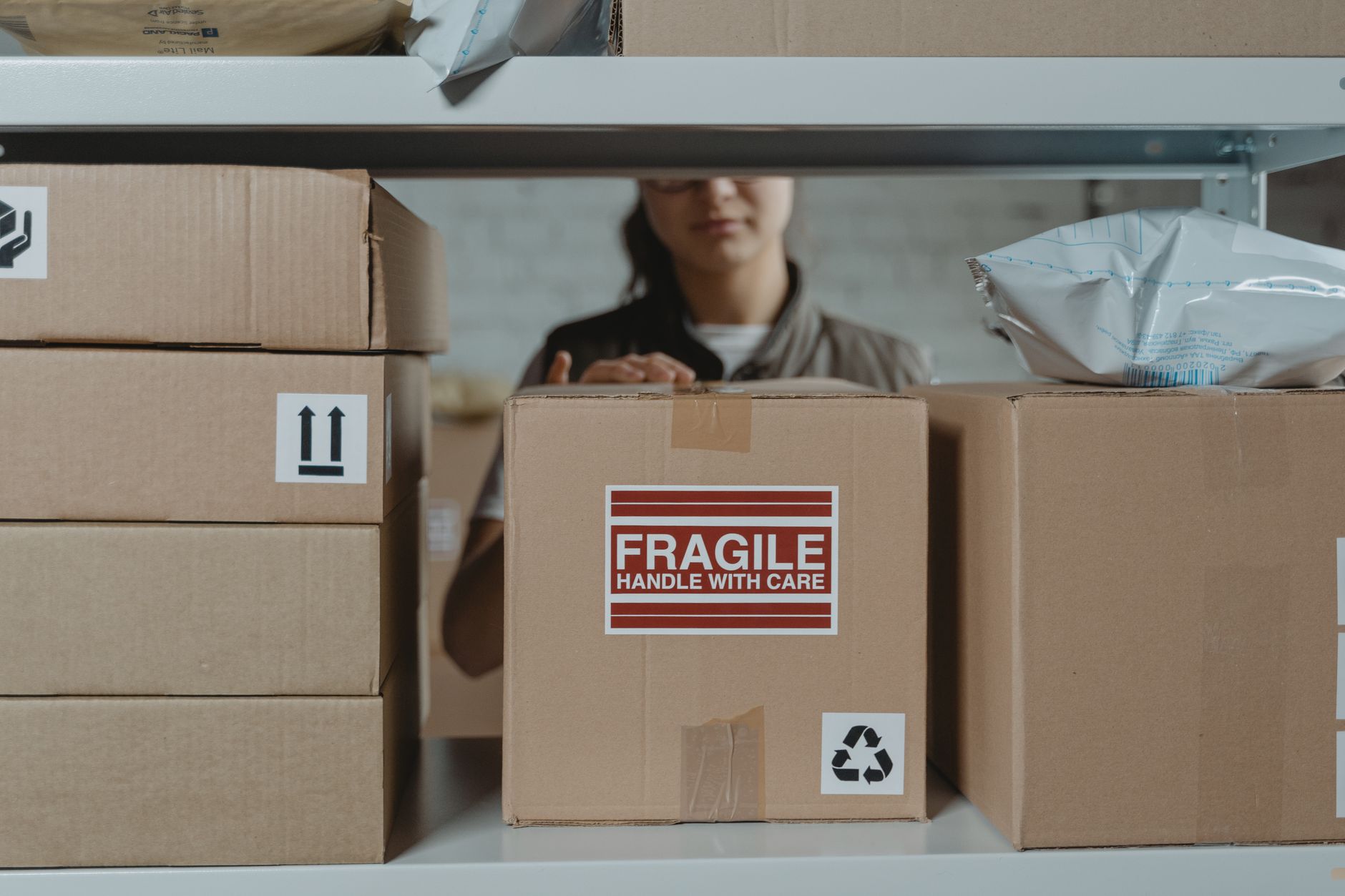 Engineer conducting a package drop test