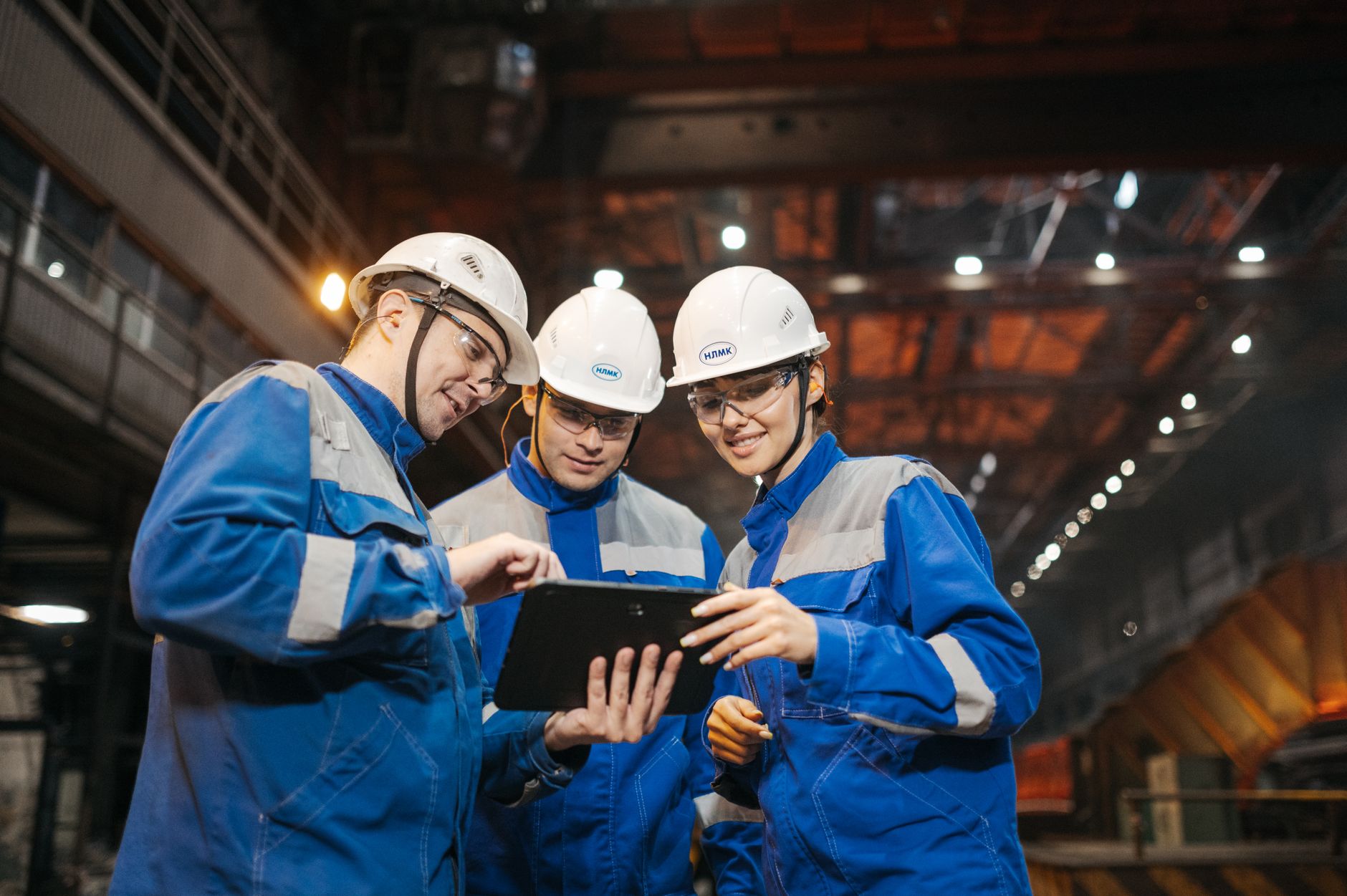 Cross-functional team reviewing data together on the shop floor