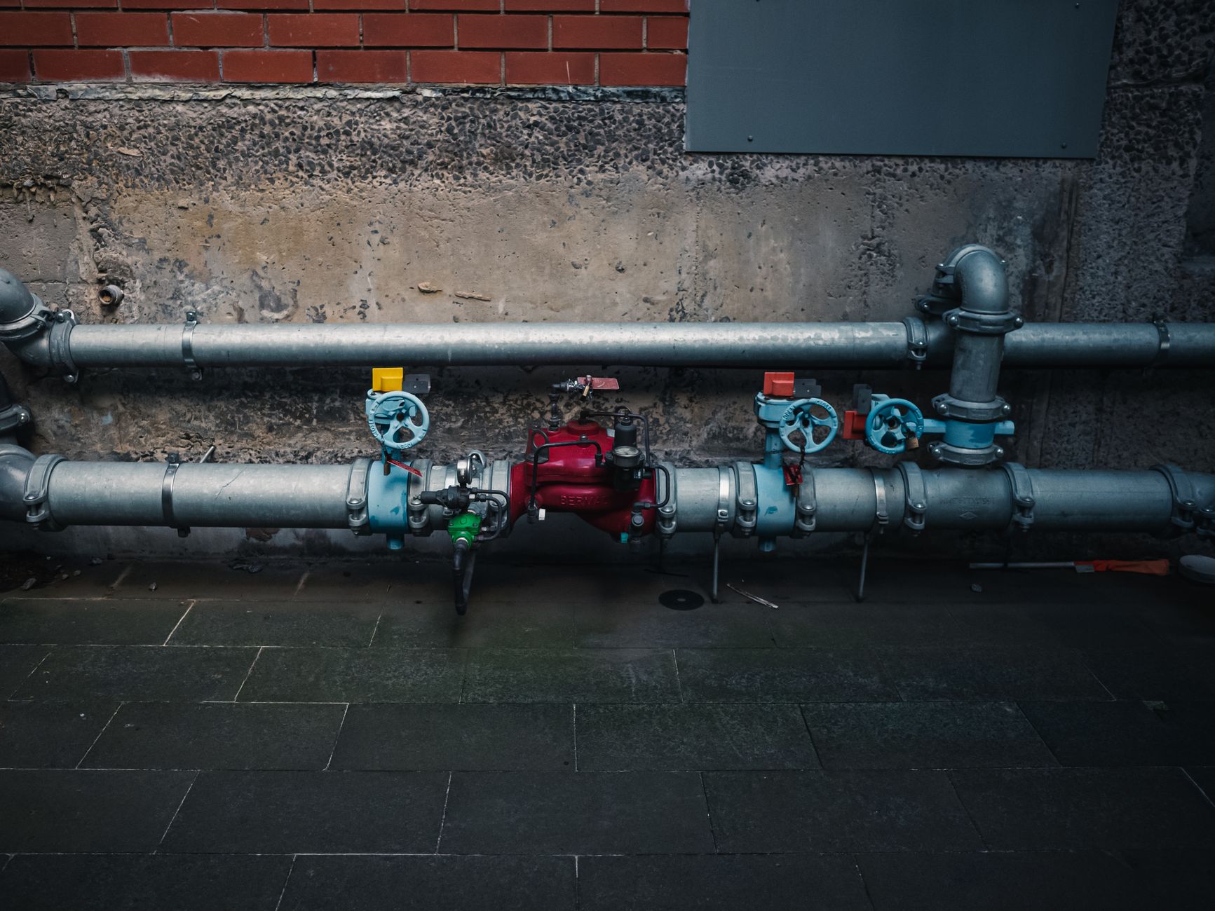 Technician checking a water recirculation system